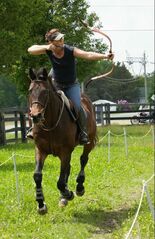 Toby with Jessica doing mounted archery